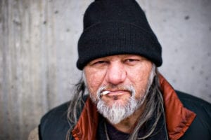 homeless man smoking